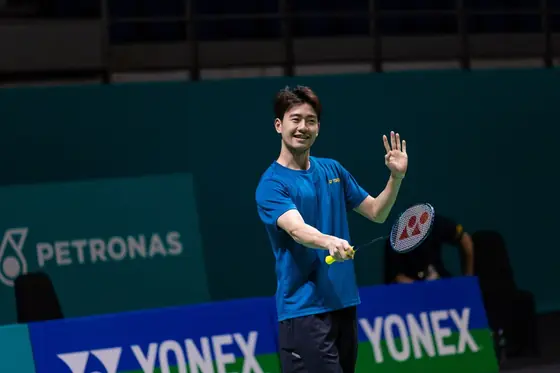 Badminton player portrait moment